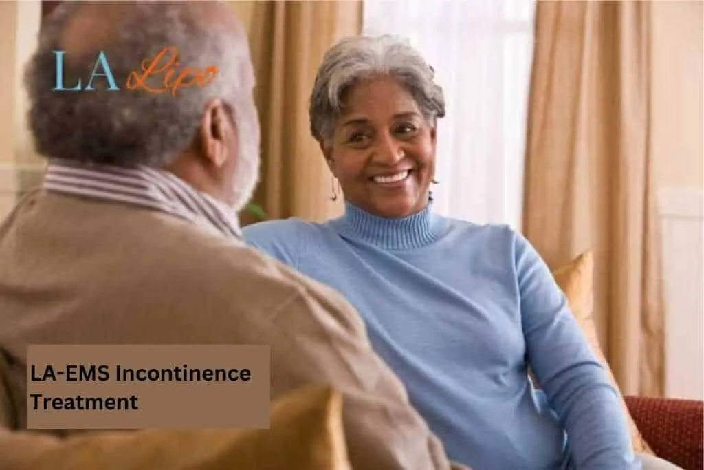 Couple sat smiling at each other - LA-EMS treatment Peterborough