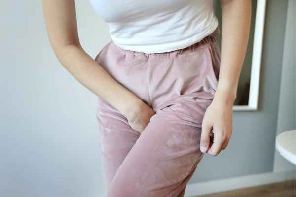 older woman running to the toilet because of urinary incontinence Peterborough